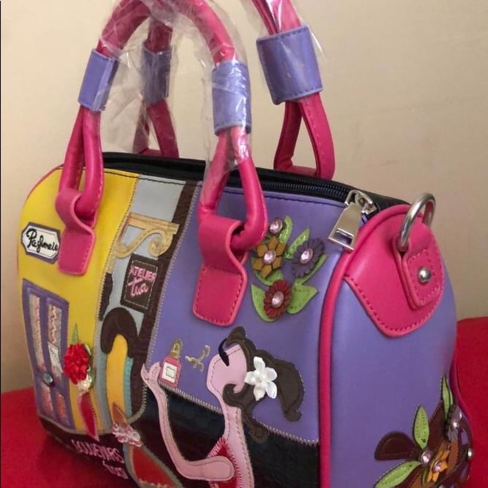 Funky bag to resemble Italian brand “Braccialini”.